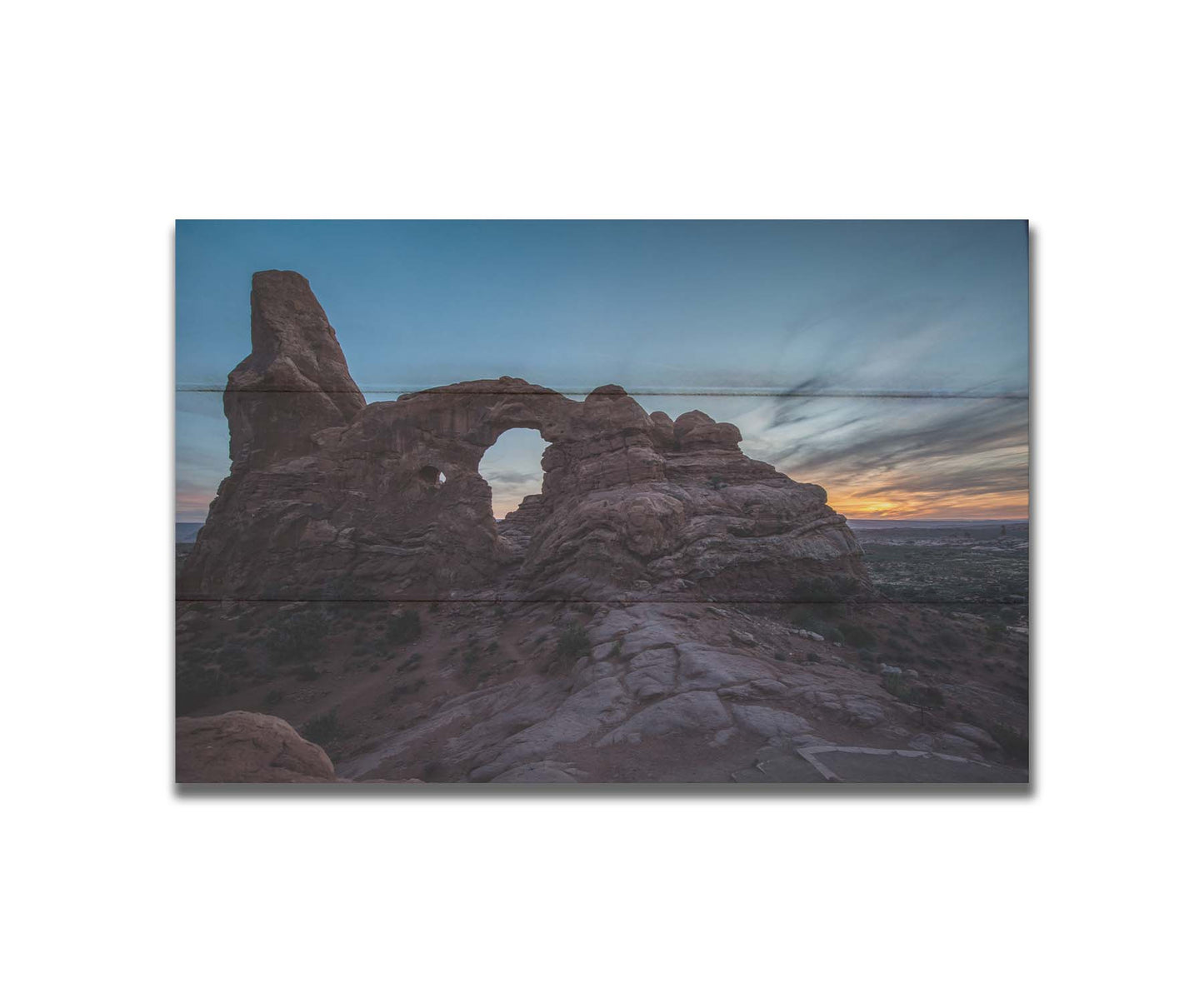 A photo of the Turret Arch rock formation at Arches National Park, Utah during sunset. Printed on a box board.