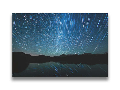 A photo of the Perseid Meteor shower reflecting off of Mirror Lake in Utah. Printed on canvas.