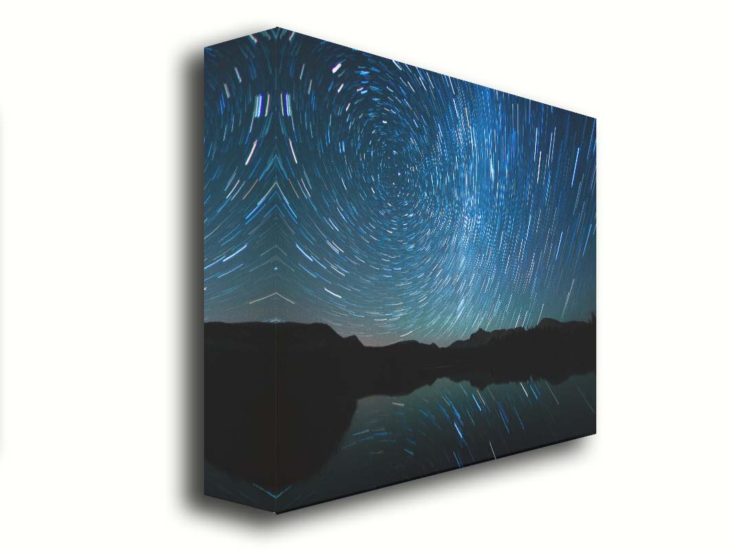 A photo of the Perseid Meteor shower reflecting off of Mirror Lake in Utah. Printed on canvas.