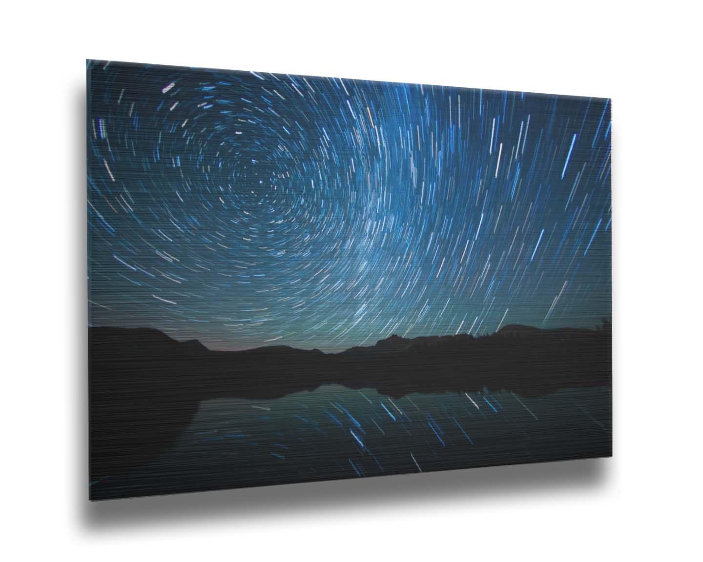 A photo of the Perseid Meteor shower reflecting off of Mirror Lake in Utah. Printed on metal.