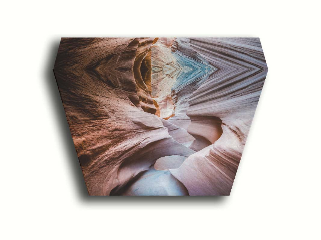 A photo looking through Peek-A-Boo slot canyon near Escalante, Utah. The wavy layers of sandstone have an unusual, surreal appearance. Printed on canvas.