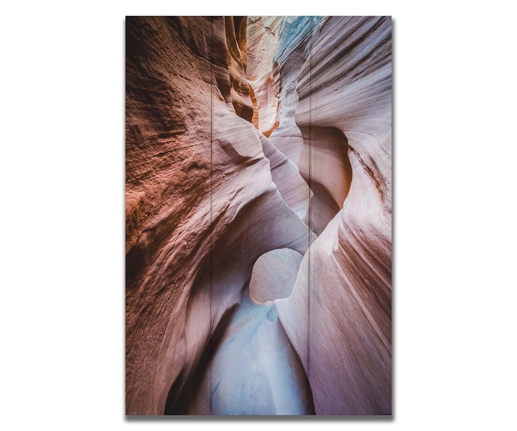 A photo looking through Peek-A-Boo slot canyon near Escalante, Utah. The wavy layers of sandstone have an unusual, surreal appearance. Printed on a box board.