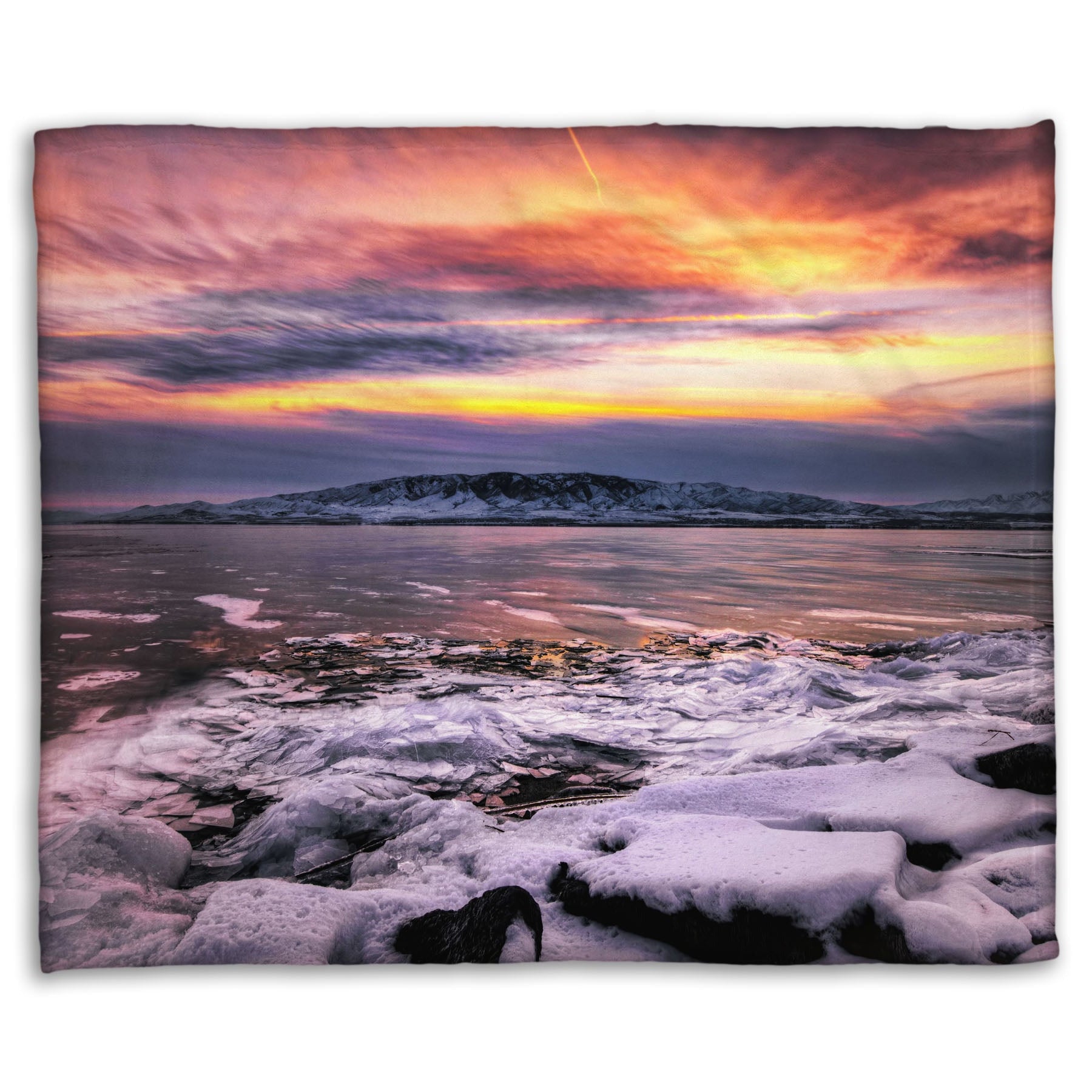 A coral fleece blanket designed with the photo of a sunset over an icy lake at Mount Timpanogos, Utah, one Christmas evening.
