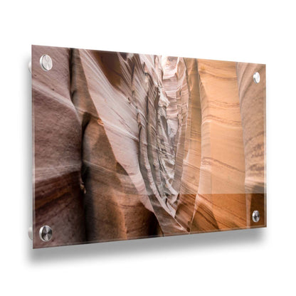 A photo of the Zebra Slot Canyon at Grand Staircase-Escalante National Monument, Utah. The red and orange sandstone stripes alternate in sharp waves down the length of the narrow passageway. Printed on acrylic.