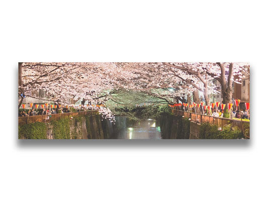 Photo of cherry blossom trees over a canal at Meguro River in Tokyo, Japan. Printed on canvas.