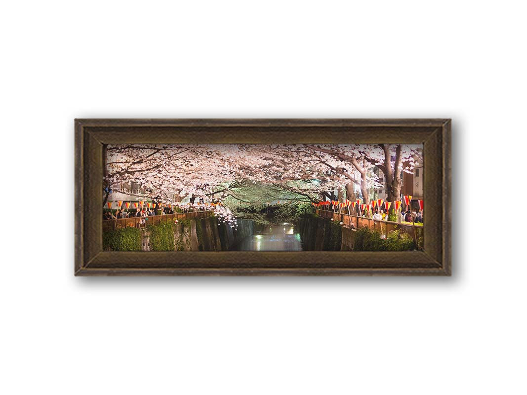 A panoramic photo of the Wave rock formation, at the Coyote Buttes North area of the Utah-Arizona border. The stripes of reddish-brown stone create a unique wave-like shape. Printed on canvas and framed.