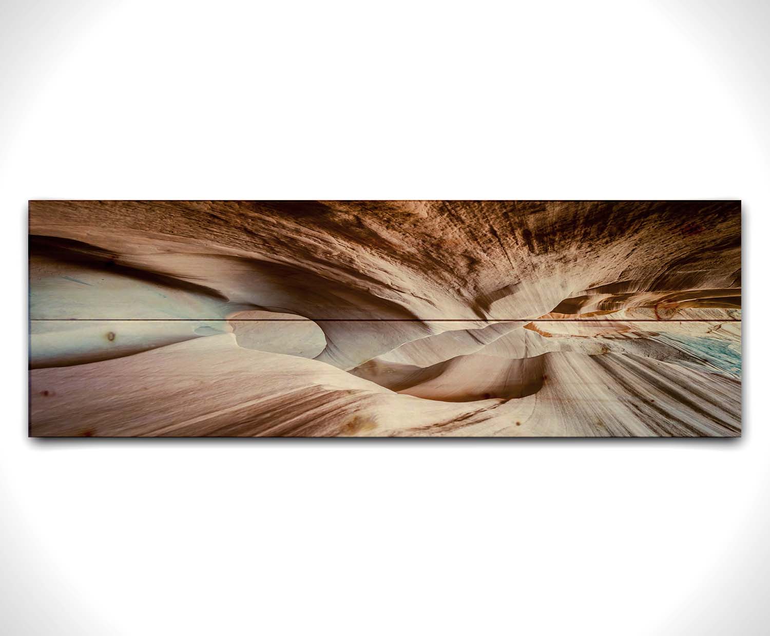 A photo looking through Peek-A-Boo slot canyon near Escalante, Utah. The wavy layers of sandstone have an unusual, surreal appearance. Printed on a wood pallet.