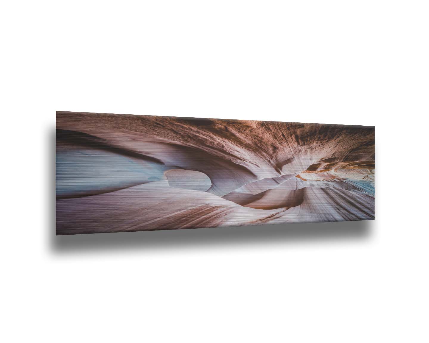 A photo looking through Peek-A-Boo slot canyon near Escalante, Utah. The wavy layers of sandstone have an unusual, surreal appearance. Printed on metal.