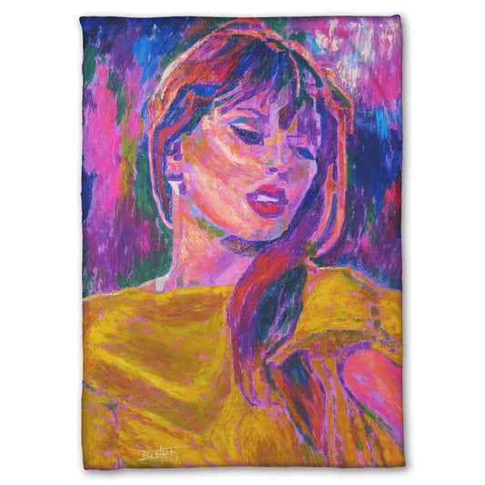 Colorful blanket printed with an impressionist painting of Taylor Swift's face in vibrant colors.