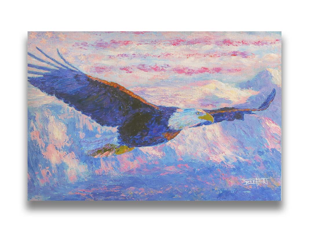 Painting of an eagle flying over the mountains using a red, white, and blue themes palette. Printed on canvas.