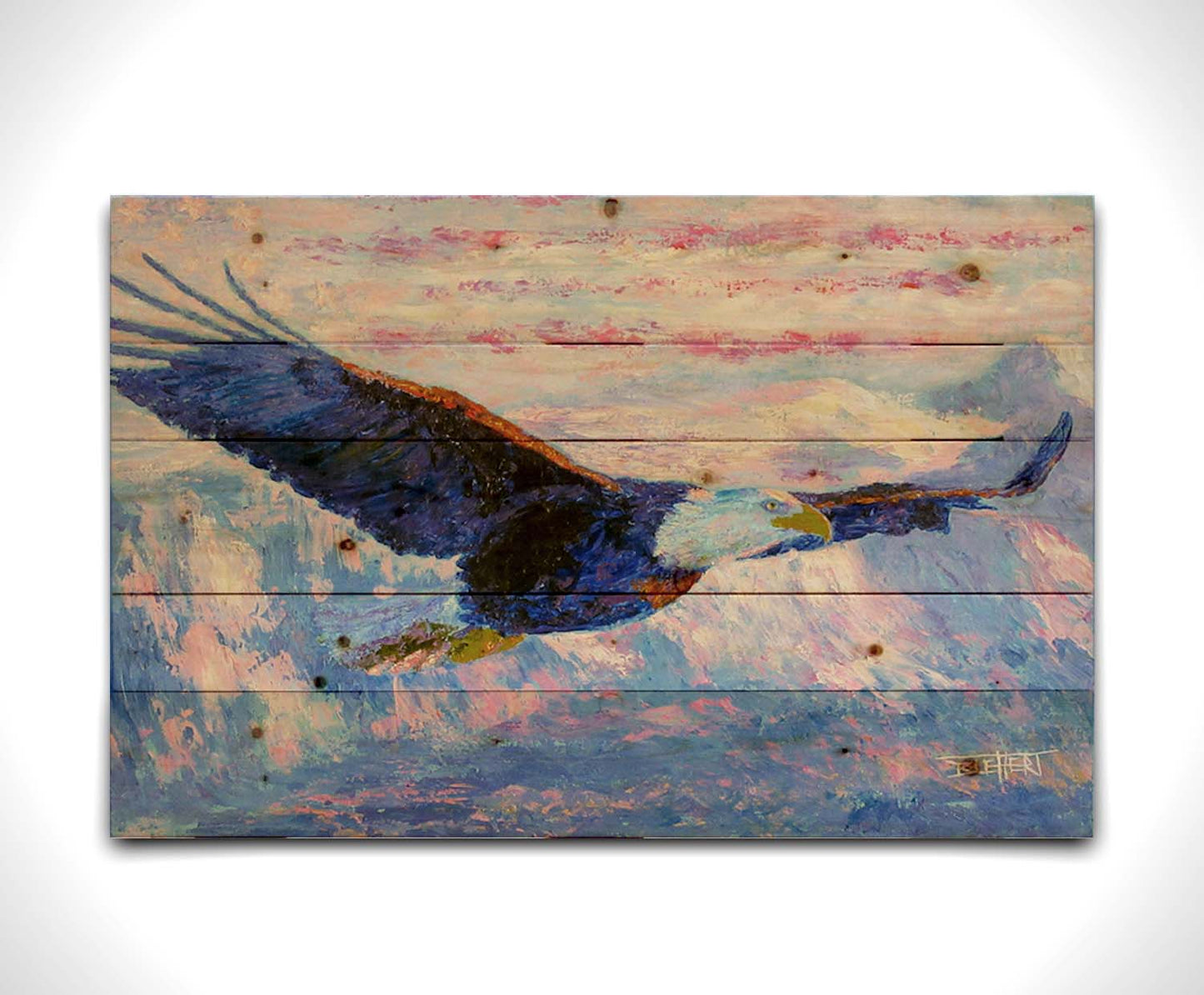 Painting of an eagle flying over the mountains using a red, white, and blue themes palette. Printed on a wood pallet.