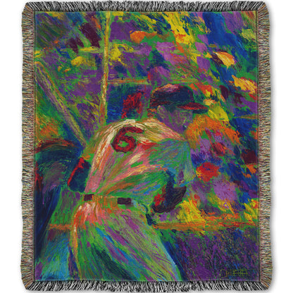 A woven throw blanket designed with a painting of baseball player Stan Musial, waiting at bat.