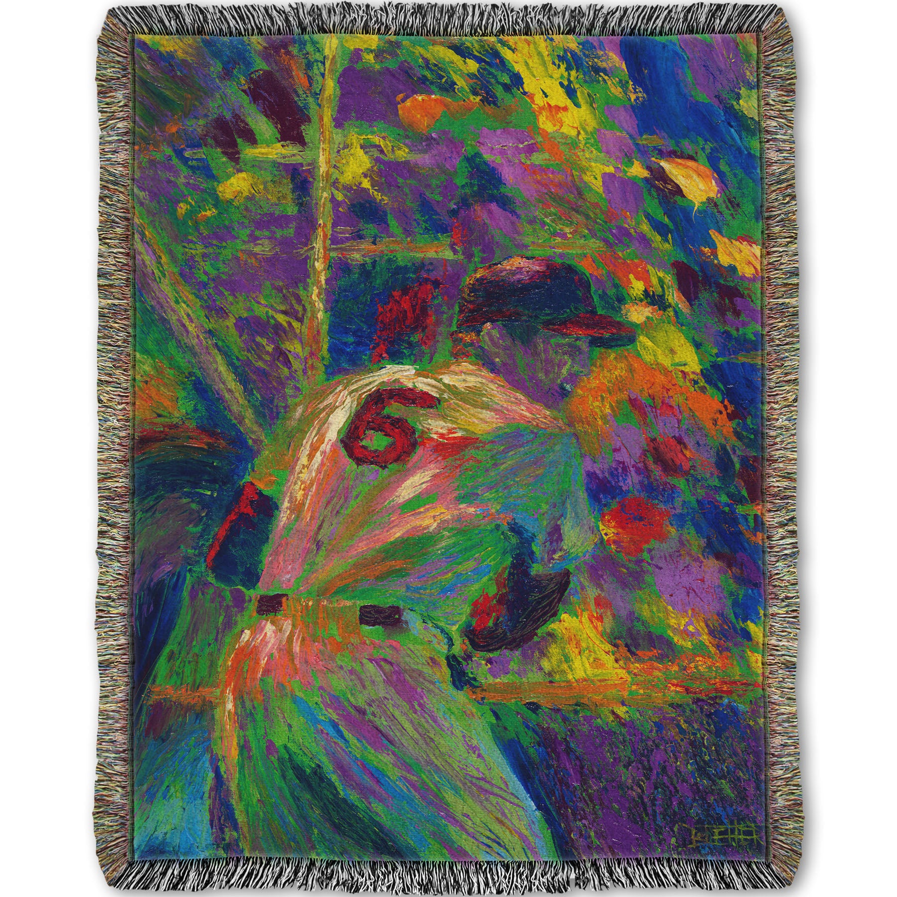 A woven throw blanket designed with a painting of baseball player Stan Musial, waiting at bat.