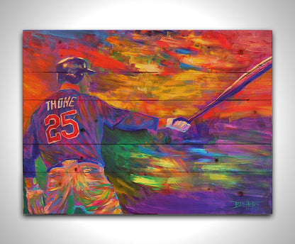 A painting of baseball player Jim Thome holding a baseball bat. It is painted using arbitrary color, in a vibrant spectrum of hues. Printed on a wood pallet.