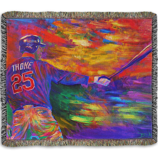 A woven throw blanket designed with a painting of baseball player Jim Thome holding a baseball bat. It is painted using arbitrary color, in a vibrant spectrum of hues.