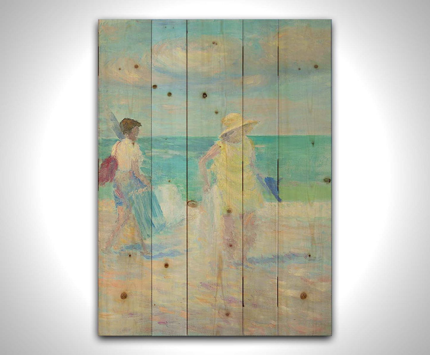 A painting of two people on the beach, carrying towels and chairs and umbrellas. The ocean is calm behind them as they walk through the sand. Printed on a wood pallet.