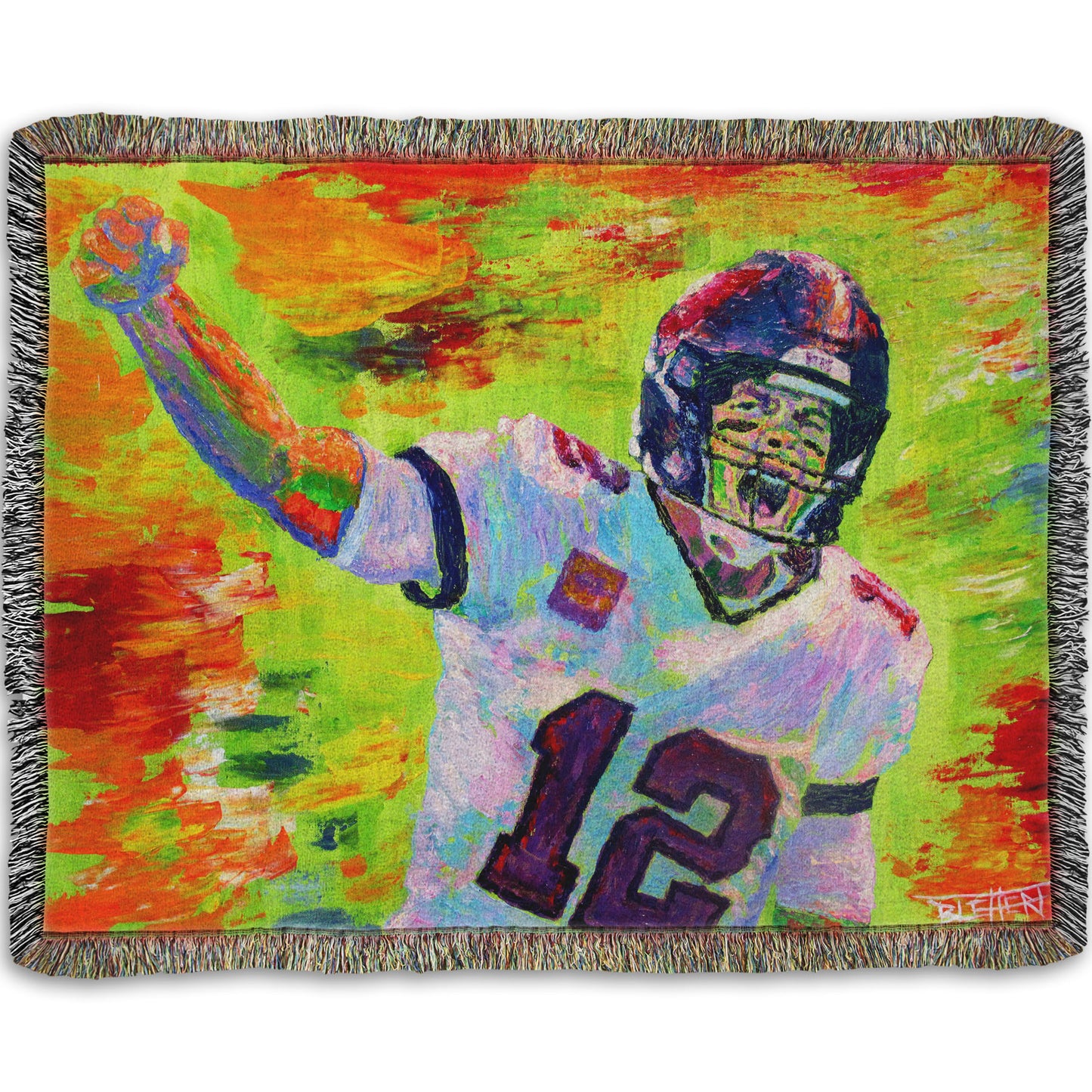 A woven throw pillow designed with a painting of American football player Tom Brady yelling with his fist in the air, rallying his teammates. Arbitrary colors and visible brushstrokes add to the energy of this painting, alongside the bright greens, reds, and oranges of the backdrop.