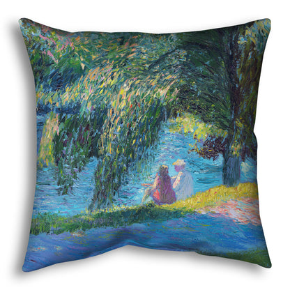 A square throw pillow designed with a painting of two people sitting by the water, near a park sidewalk, with a large tree above them.
