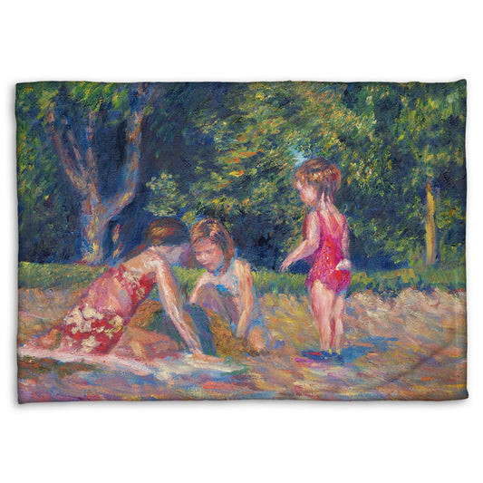 A fleece blanket designed with a painting of three children playing in the sand at a beach. Their red swimsuits contrast the green foliage in the background.