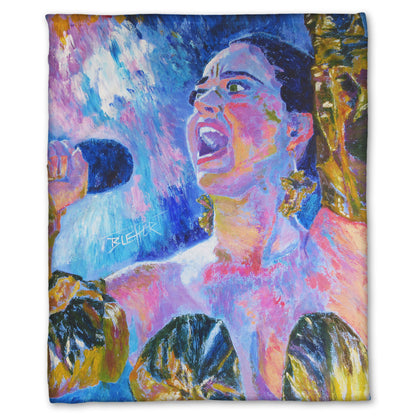 A fleece throw blanket designed with a colorful impressionist portrait of pop musician Katy Perry wearing a gold dress and singing into a microphone.