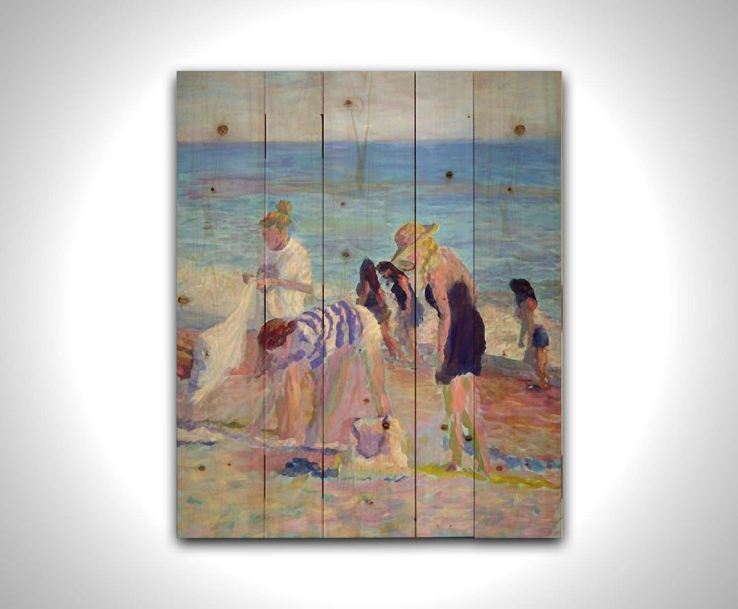 A painting of beachgoers packing up their belongings after a relaxing day. Printed on a wood pallet.