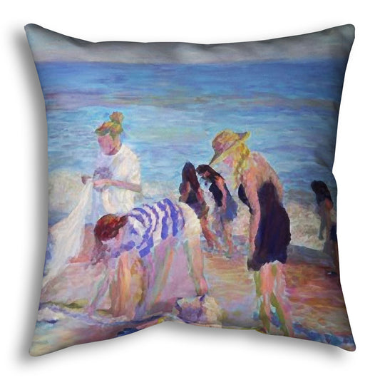 A throw pillow designed with a painting of beachgoers packing up their belongings after a relaxing day.