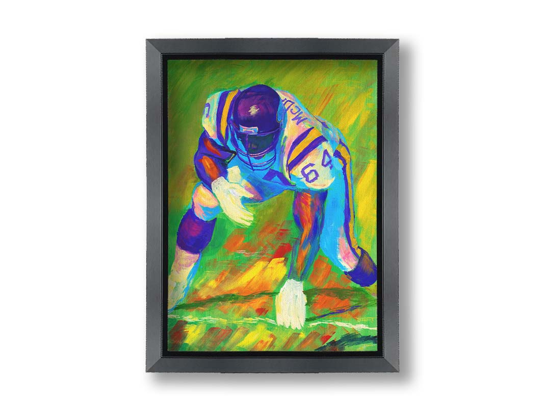 A painting of a football player, wearing white and purple, crouched on a bright green field. Printed on canvas and framed.