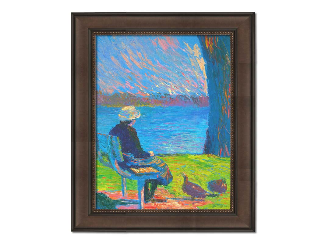 A peaceful painting of a person sitting on a bench by a lake, accompanied by two ducks on the ground. Printed on canvas and framed.