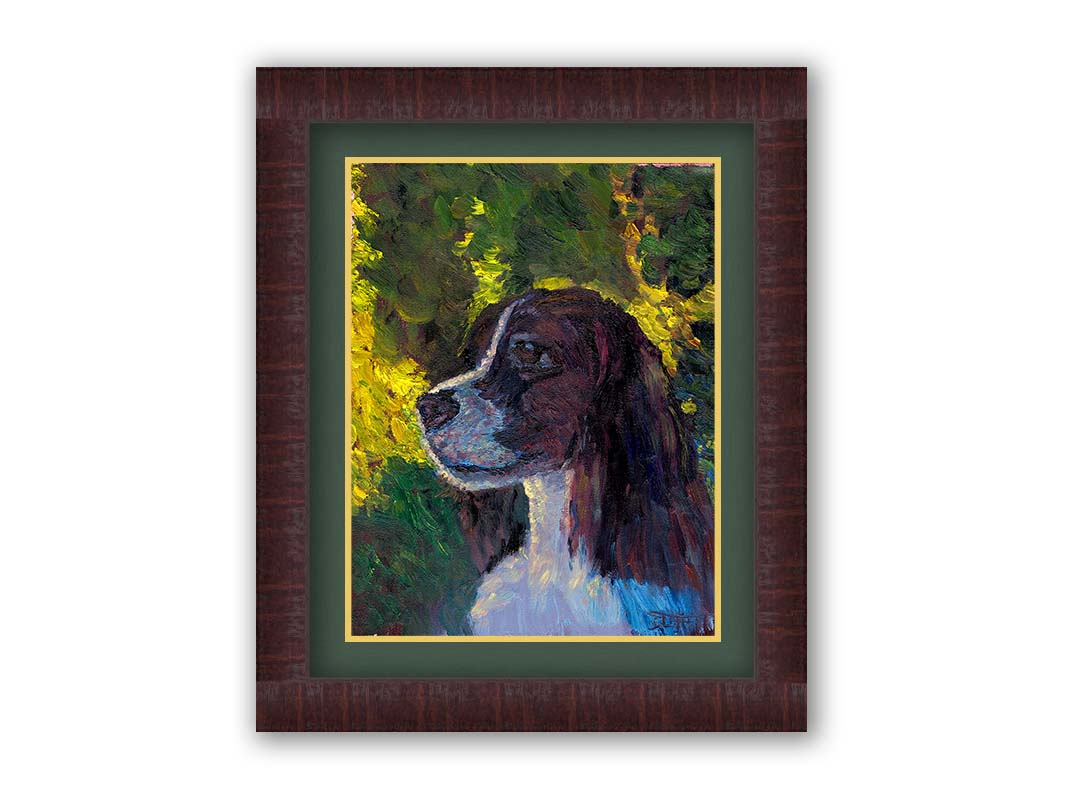 A painting of a brown and white spaniel dog, against a background of greens suggestinng foliage. Printed on paper, matted, and framed.