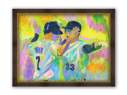 A painting of Joe Mauer and Justin Morneau from the Minnesota Twins baseball team, facing each other and talking against a yellow, pink, and green background. Printed on canvas and framed.