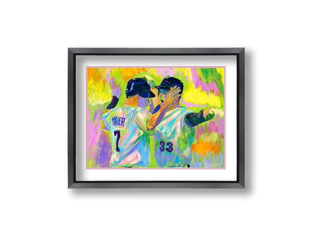 A painting of Joe Mauer and Justin Morneau from the Minnesota Twins baseball team, facing each other and talking against a yellow, pink, and green background. Printed on paper, matted, and framed.