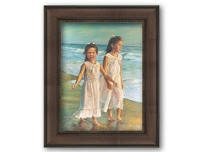 A painting of two children walking along the beach in matching white dresses. Printed on canvas and framed.