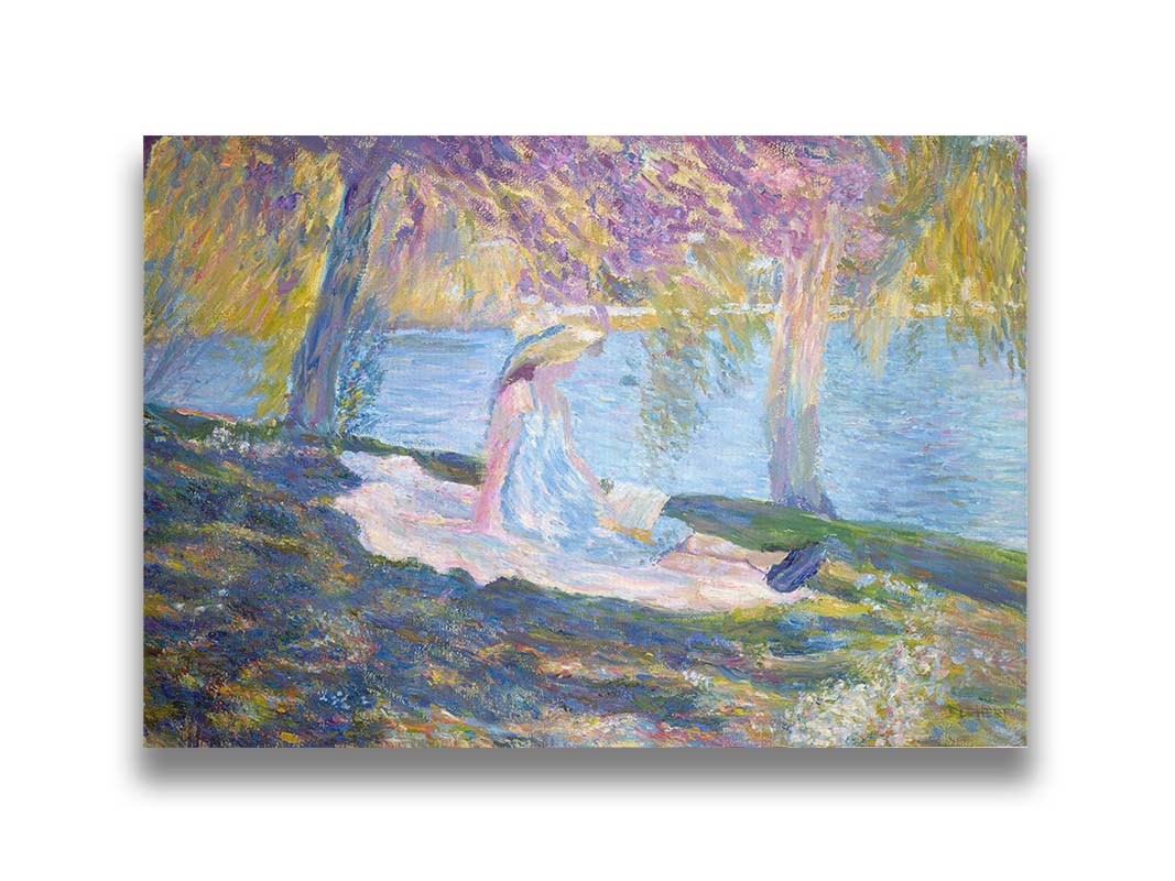 A painting of a person in a dress and sunhat, sitting on a blanket in the shade of trees by a lake, reading a book. Printed on canvas.