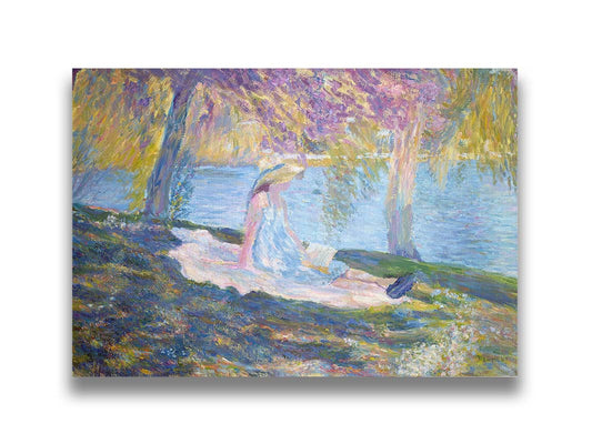 A painting of a person in a dress and sunhat, sitting on a blanket in the shade of trees by a lake, reading a book. Printed on canvas.