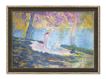 A painting of a person in a dress and sunhat, sitting on a blanket in the shade of trees by a lake, reading a book. Printed on canvas and framed.