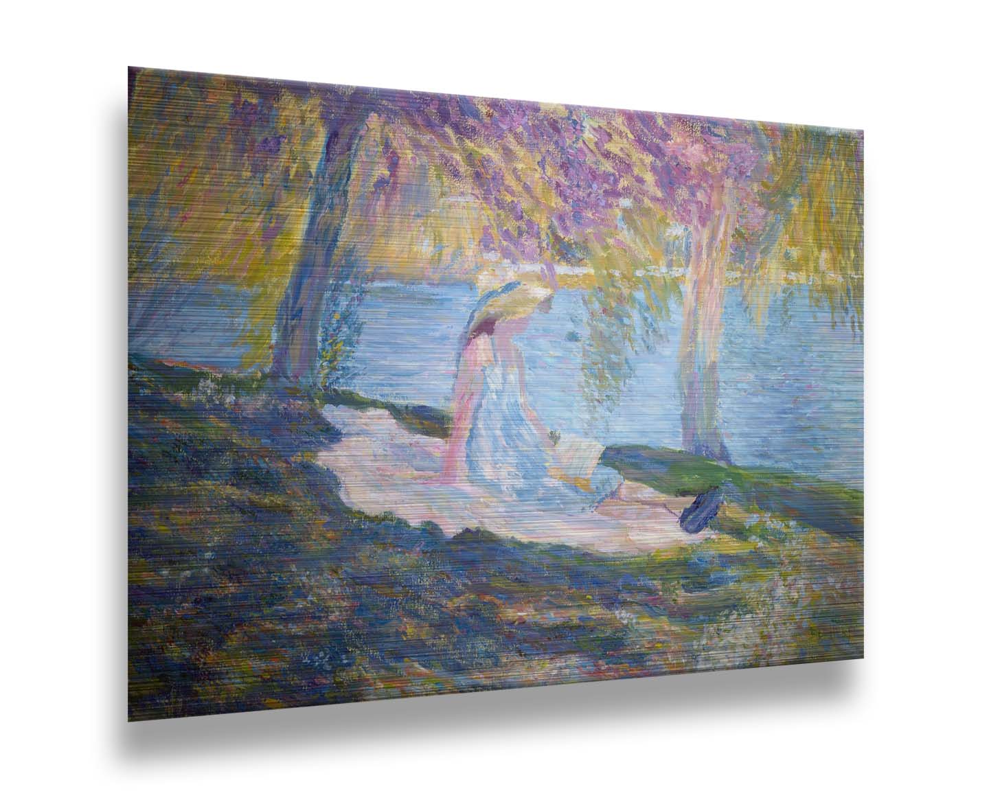 A painting of a person in a dress and sunhat, sitting on a blanket in the shade of trees by a lake, reading a book. Printed on metal.