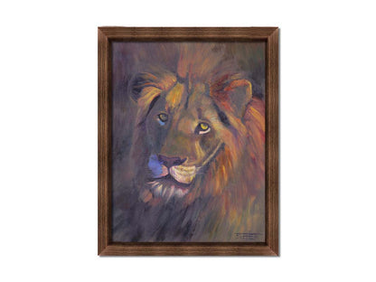 A portrait painting of a lion, accented with a soft gold light and purple shadows. Printed on canvas and framed.