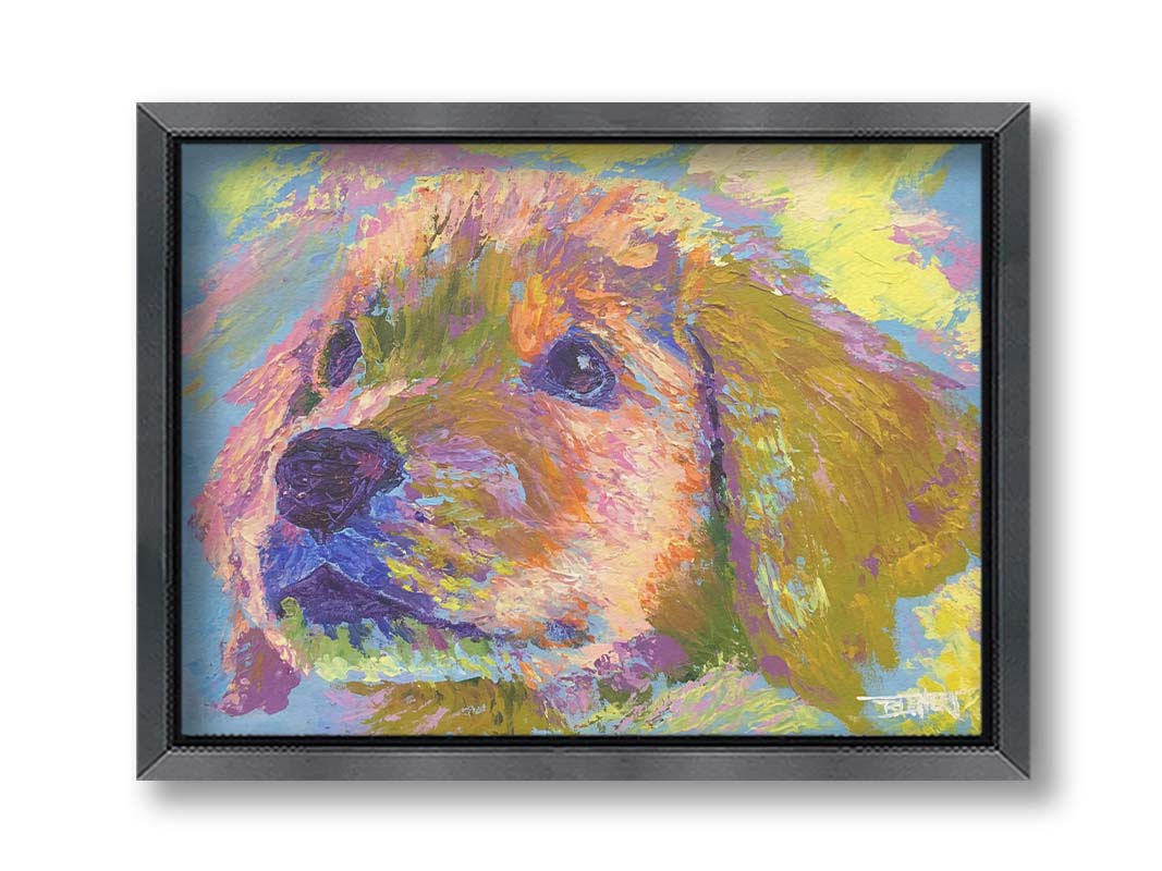 A painting of a golden retrieveer puppy close up. Printed on canvas and framed.