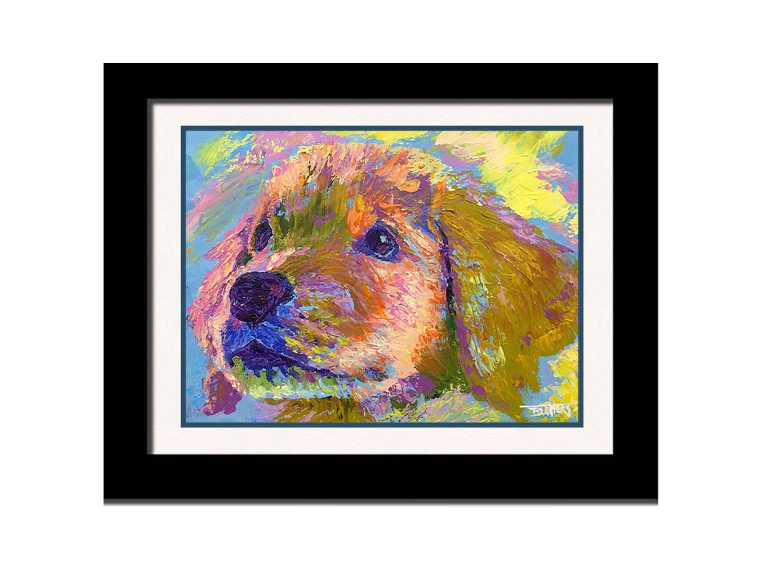 A painting of a golden retrieveer puppy close up. Printed on paper, matted, and framed.