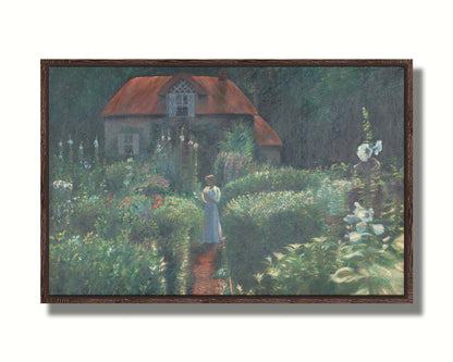 A painting of a person standing in a proliferous garden before a small house. Bushes of flowers in red, blue, white, yellow, and pink fill the scene. Printed on canvas in a float frame.