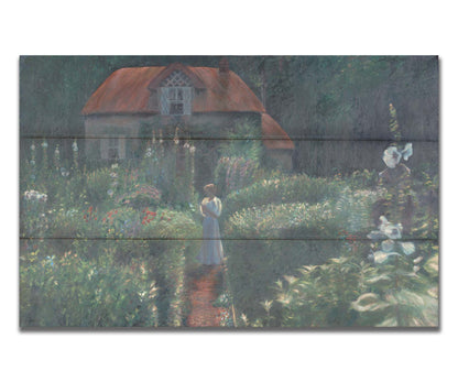 A painting of a person standing in a proliferous garden before a small house. Bushes of flowers in red, blue, white, yellow, and pink fill the scene. Printed on a wood pallet.