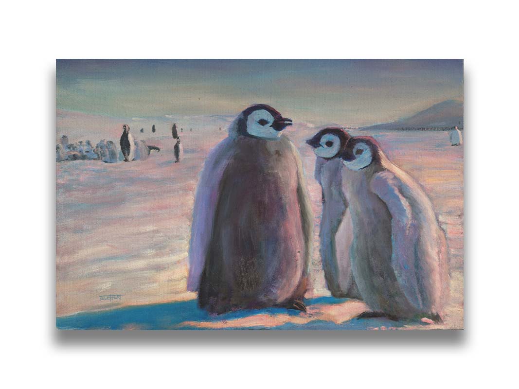 A painting of three young penguins, their colony in the background standing on the icy landscape. Printed on canvas.