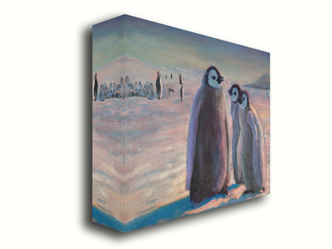 A painting of three young penguins, their colony in the background standing on the icy landscape. Printed on canvas.