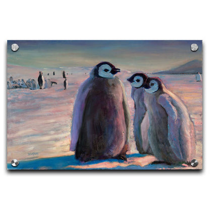 A painting of three young penguins, their colony in the background standing on the icy landscape. Printed on acrylic.