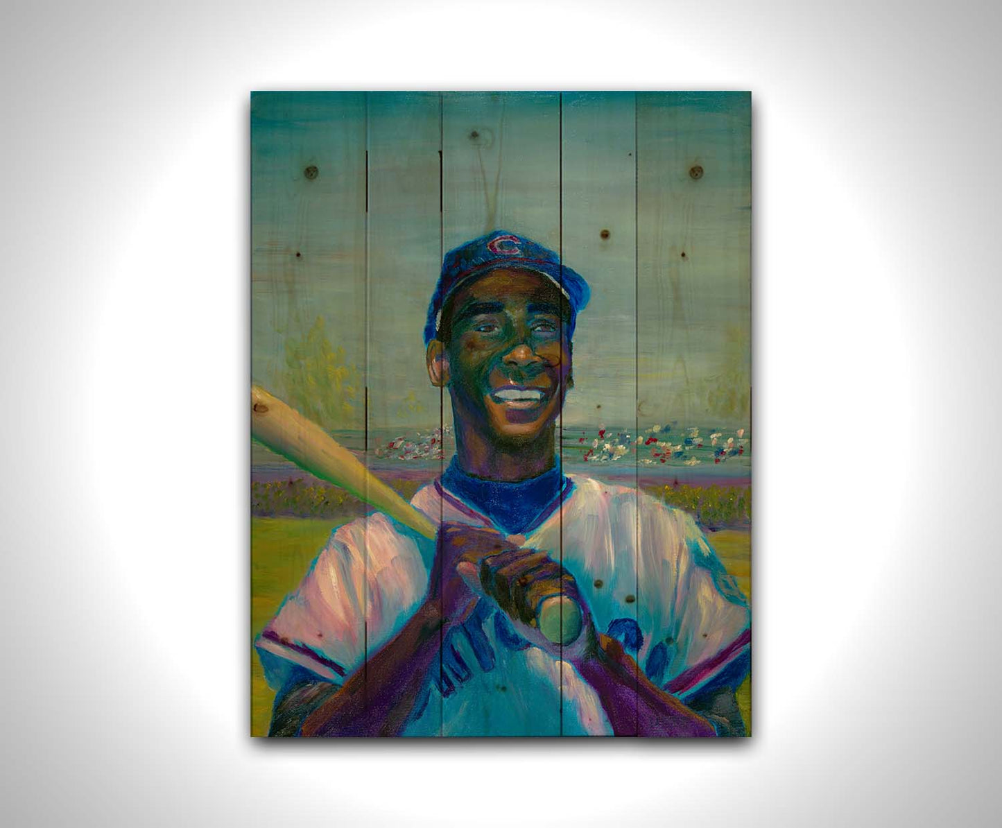 A painting of Ernie "Mr. Sunshine" Banks of the Chicago Cubs, smiling with a baseball bat over his shoulder. Printed on a wood pallet.