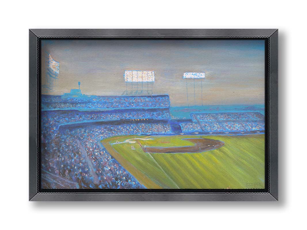 A painting of the Old Met Stadium in Minnesota. The stadium lights are bright as the sun begins to set. Printed on canvas and framed.