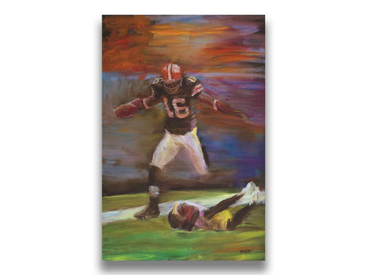 A painting of Cleveland Browns football player Josh Cribbs as he runs with the ball, dodging over another playerr. Printed on canvas.