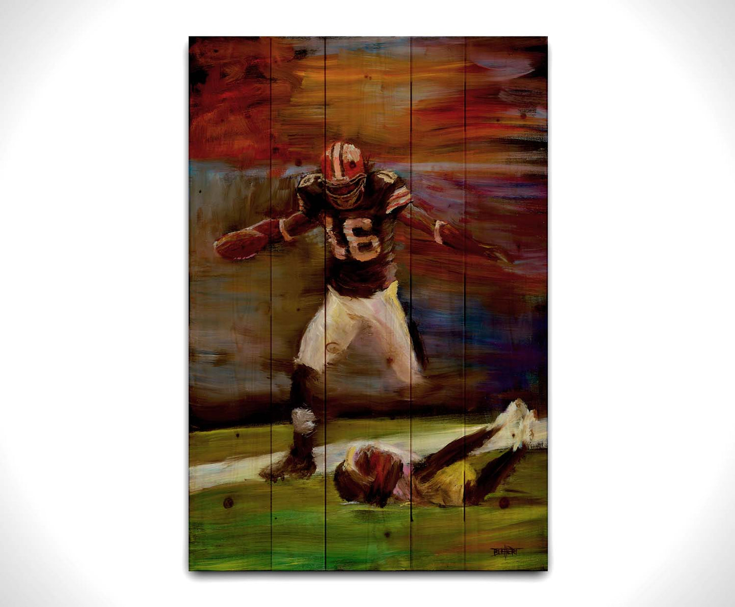 A painting of Cleveland Browns football player Josh Cribbs as he runs with the ball, dodging over another playerr. Printed on a wood pallet.