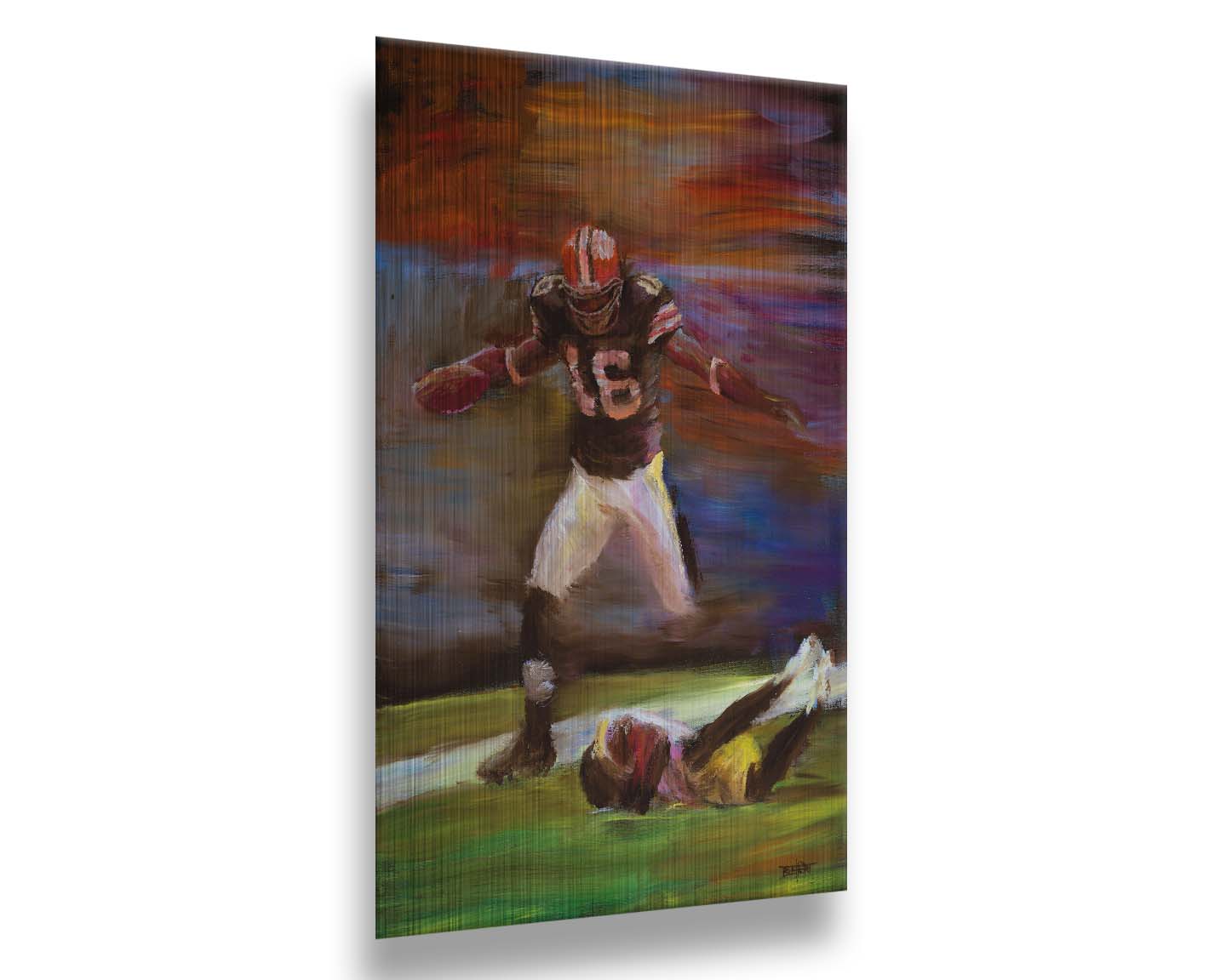 A painting of Cleveland Browns football player Josh Cribbs as he runs with the ball, dodging over another playerr. Printed on metal.