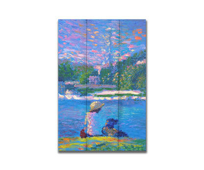 A painting of a person and their dog, sitting by the water. The Seattle Space Needle can be seen in the distance. Printed on a box board.